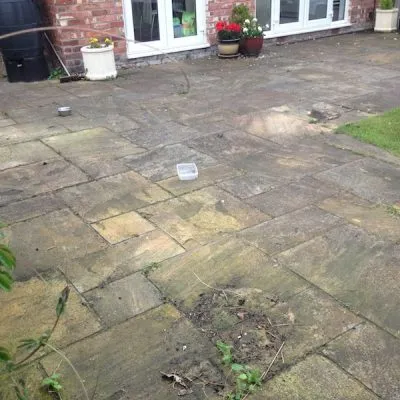 Indian sandstone patio before cleaning by www.cleaning-service.uk.com taken in skelmersdale