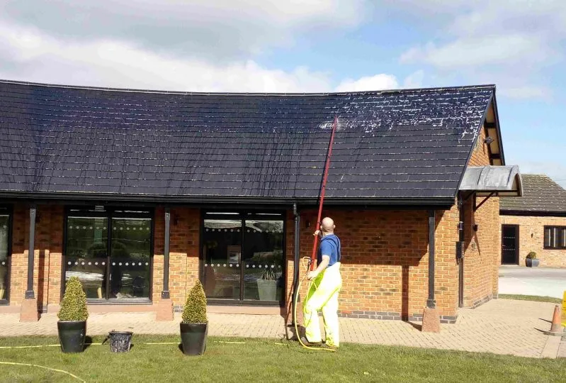 image of How to remove moss on roofs www.cleaning-service.uk.com
