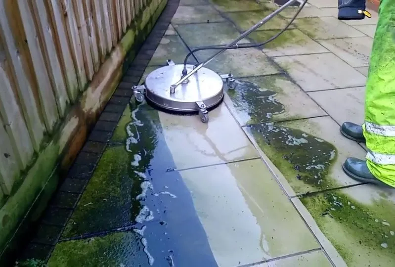 cleaning a patio in Southport with rotary surface cleaner