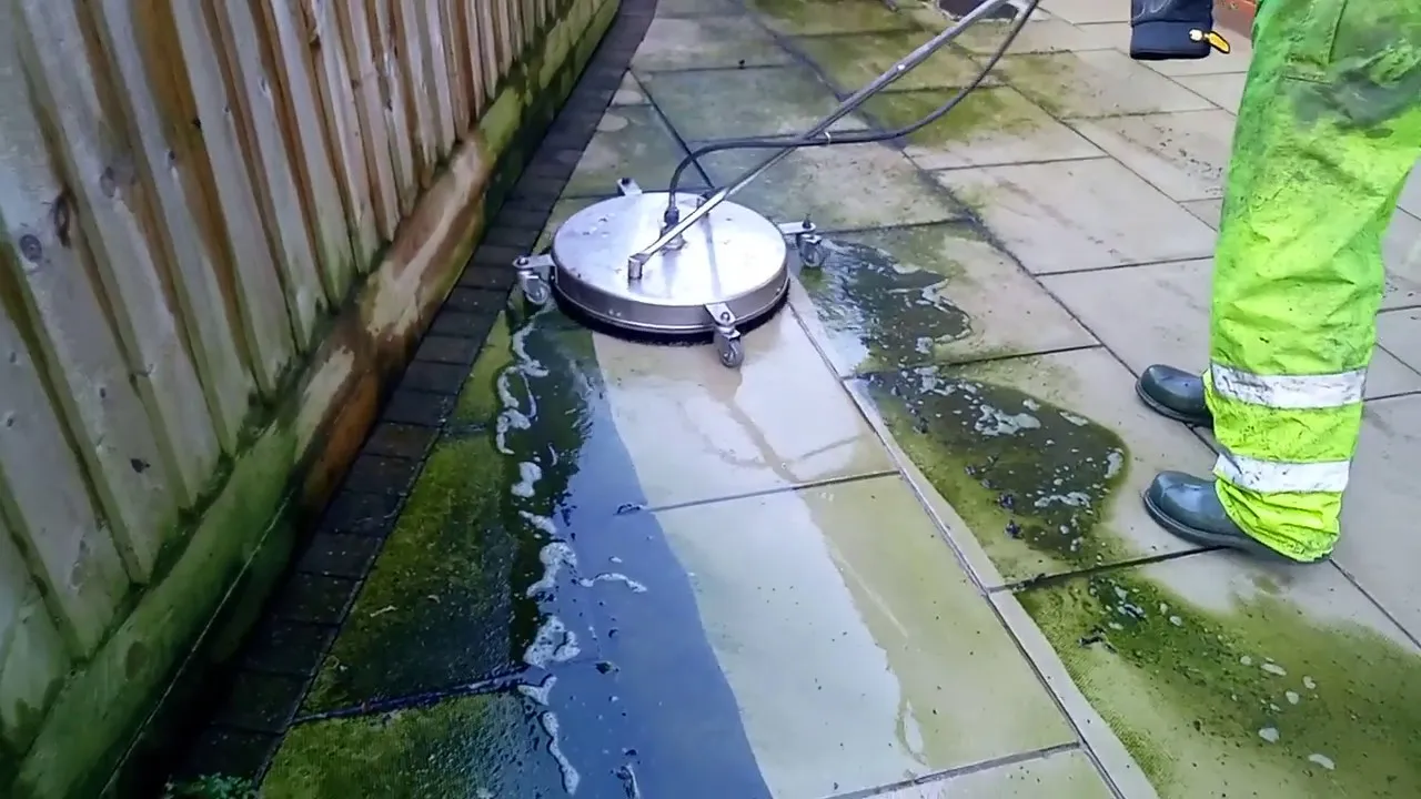 cleaning a patio in Southport with rotary surface cleaner